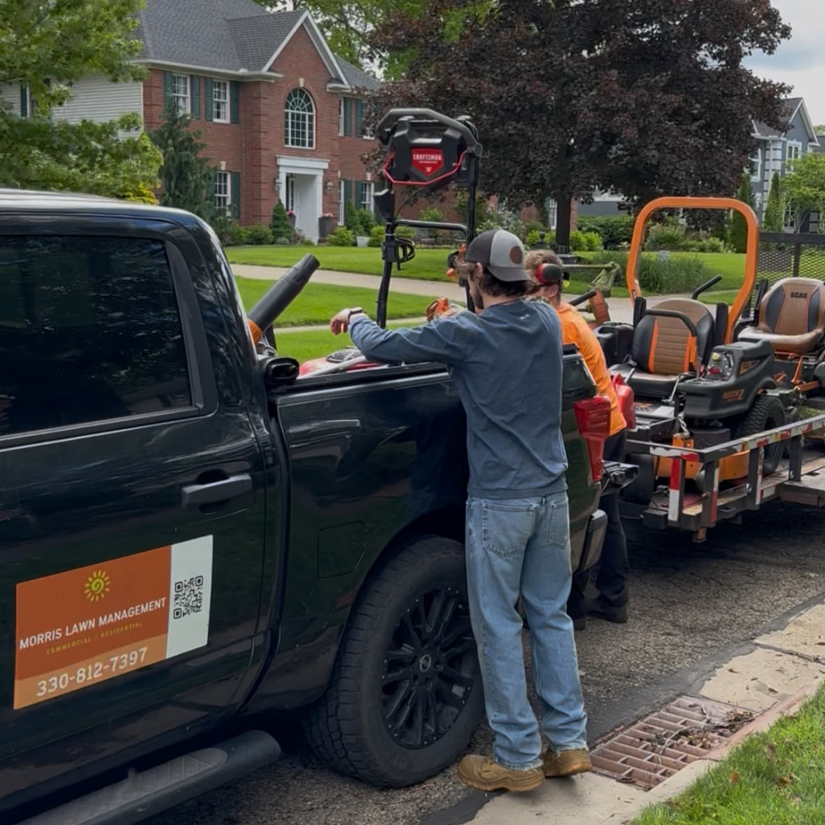 Morris Lawn Management crew and branded truck