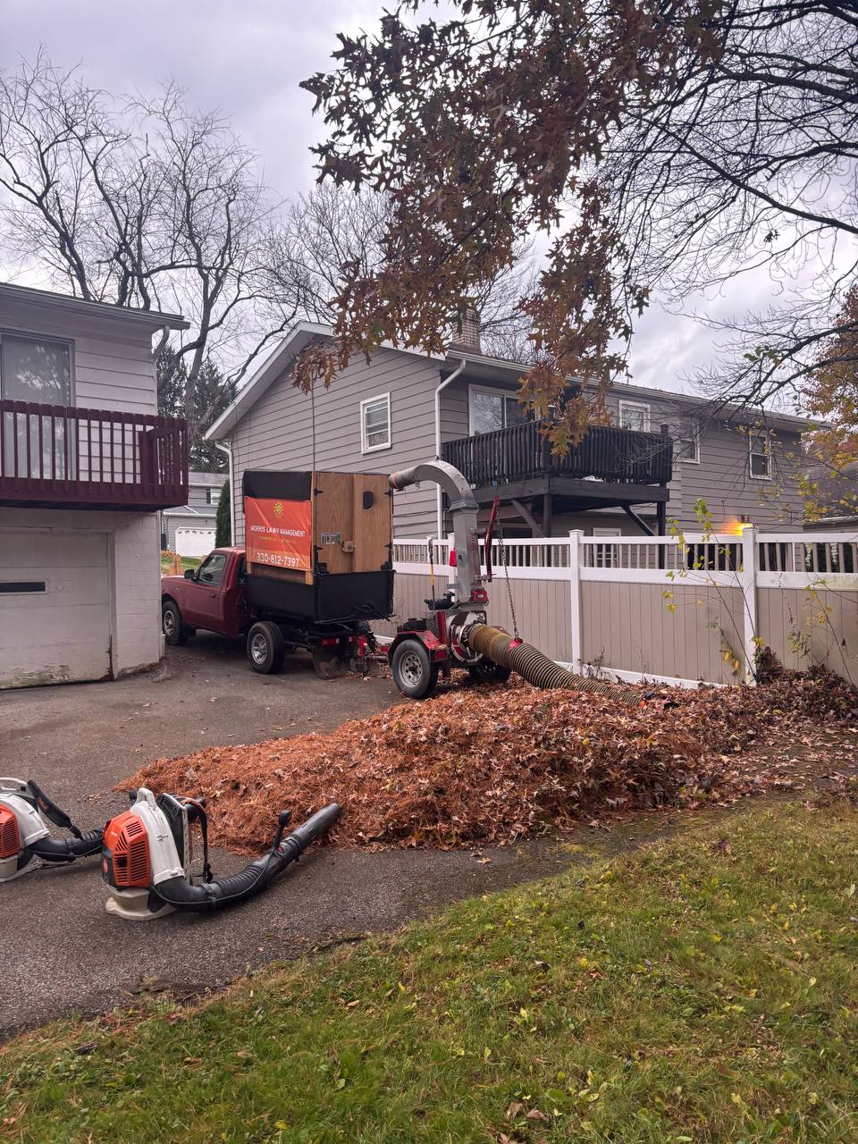 Morris Lawn Management leaf vacuum truck in action