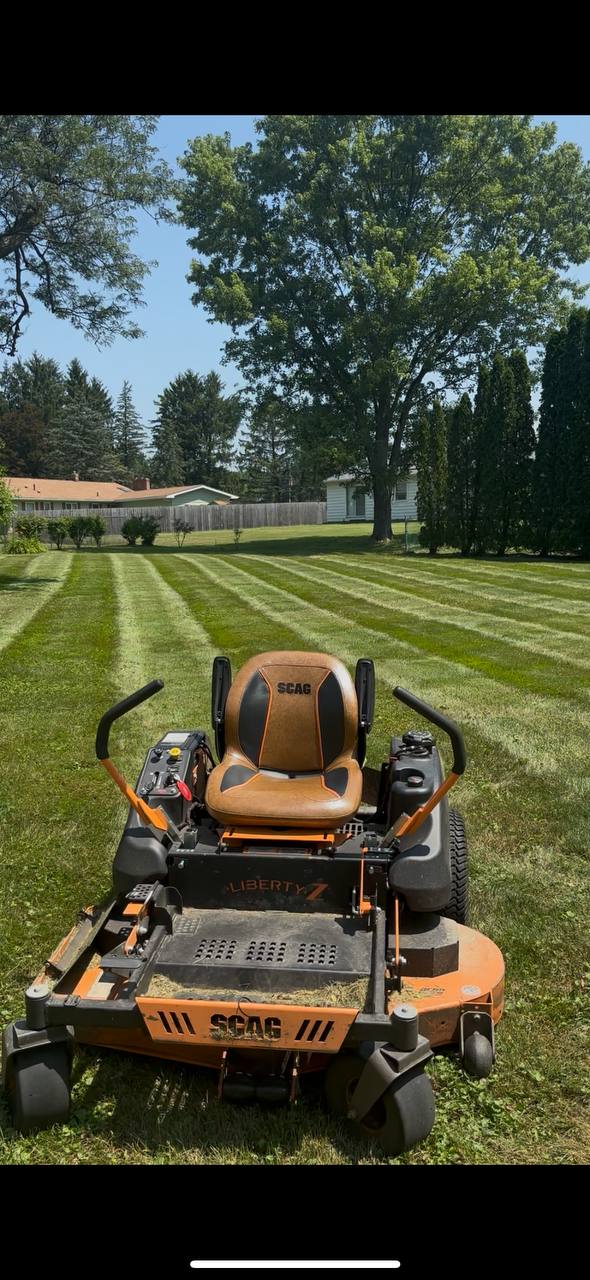 Scag Liberty Z zero-turn mower with striped lawn